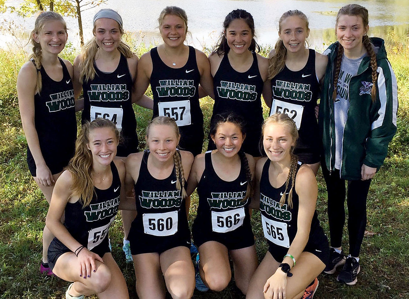Mekayla Gibson (back row, fifth from left) helped the Wiliam Woods University (WWU) Lady Owls cross country team earn an at-large bid to the National Association of Intercollegiate Athletics (NAIA) National Meet this Friday in Vancouver, Wash. Gibson is also pictured below competing at one of her meets during her freshman season in Fulton.